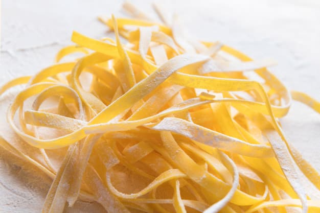 Handmade Fettuccine with Arugula Pesto